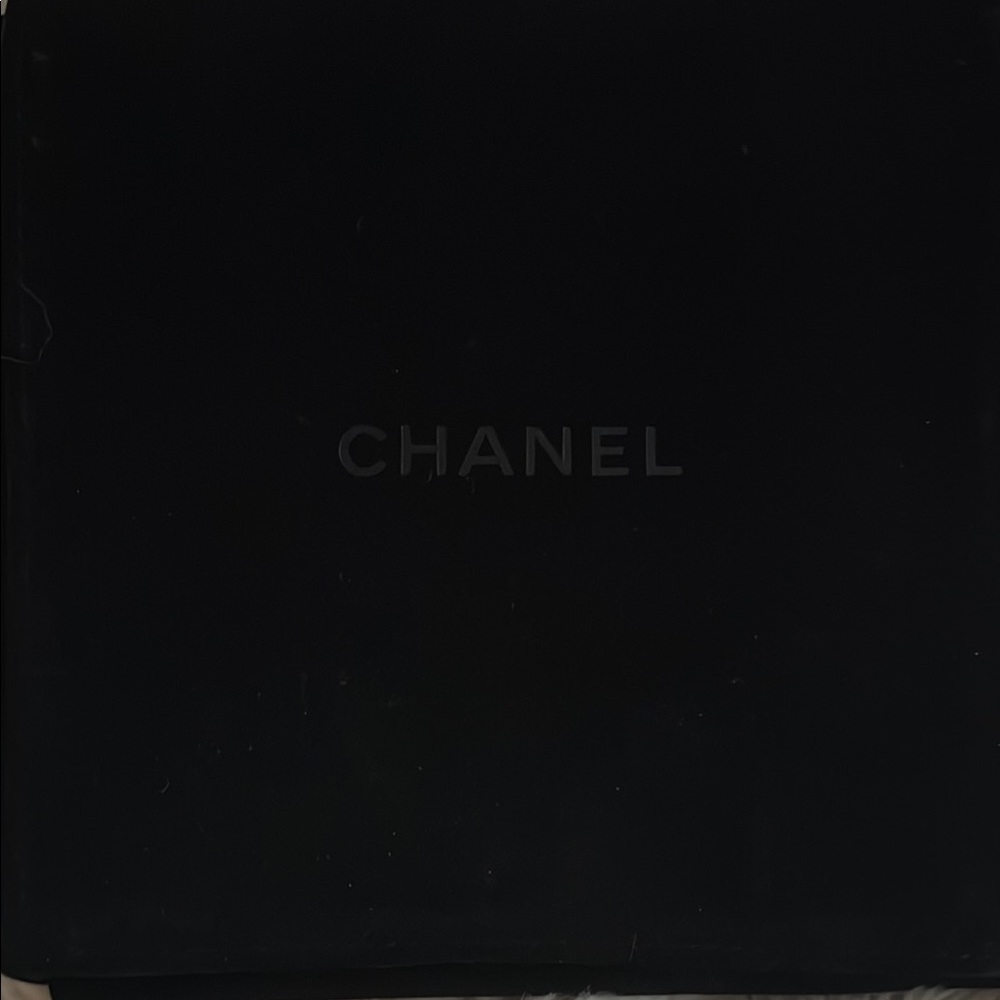 CHANEL Quilted Black Leather Pouch with Gold Chain